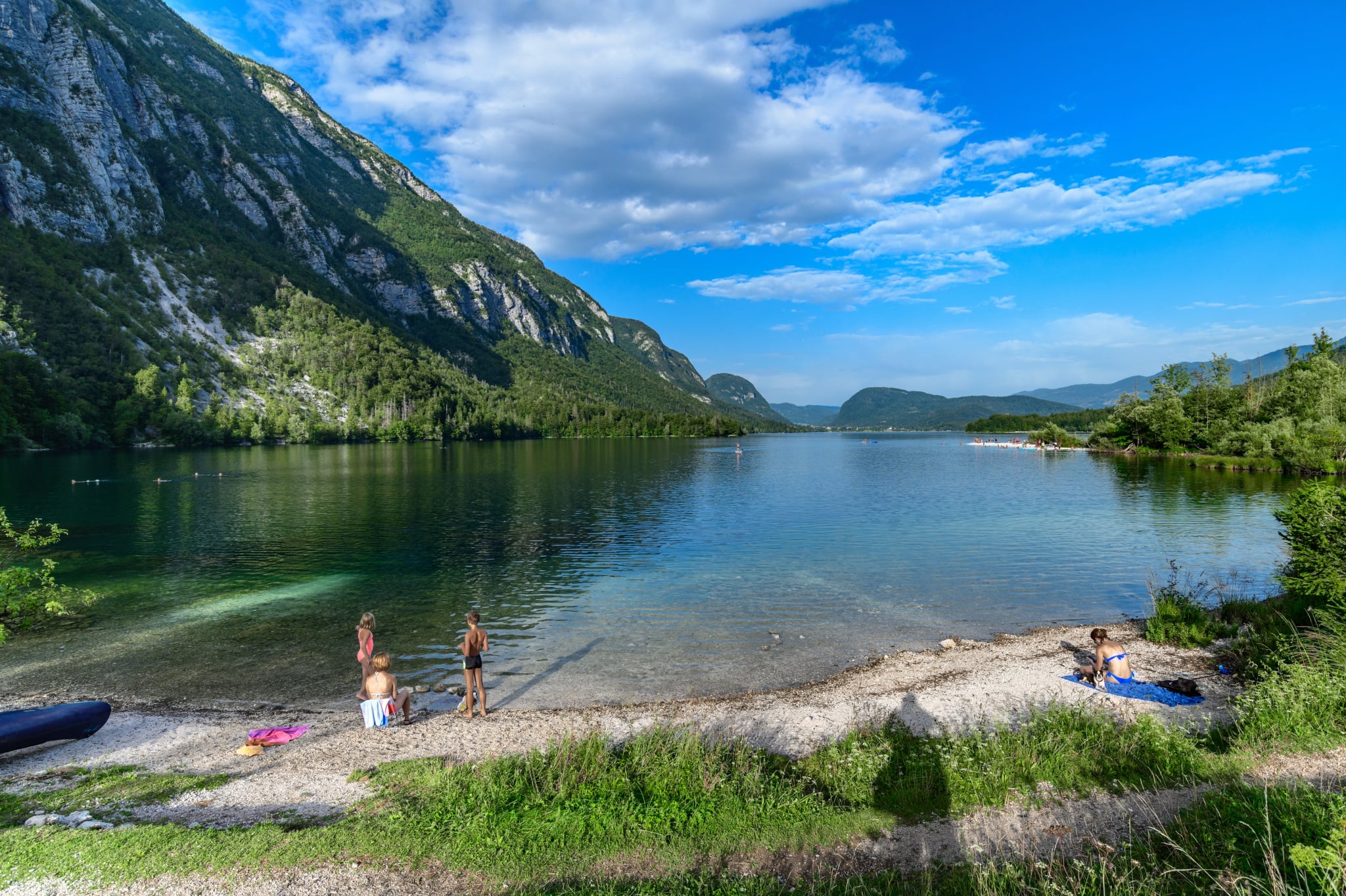 A resting place for locals on Lake Bohinj in the evening. Triglav National Park, Julian Alps, Slovenia, Europe.
