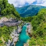 A view up the Soca river from the Napoleon Bridge in Slovenia in summertime