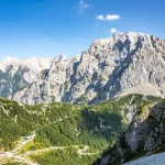 Vrsic Pass and Prisojnik, or Prisank, Mountain. Sunny day in Julian Alps, Slovenia