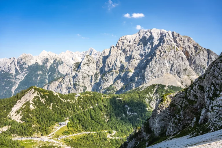 Vrsic Pass and Prisojnik, or Prisank, Mountain. Sunny day in Julian Alps, Slovenia